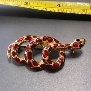 Vintage snake red with black eyes in a coiled position brooch